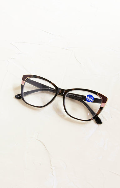 Eyeglasses with a visible brand label on a white background
