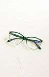 Green eyeglasses on a white background