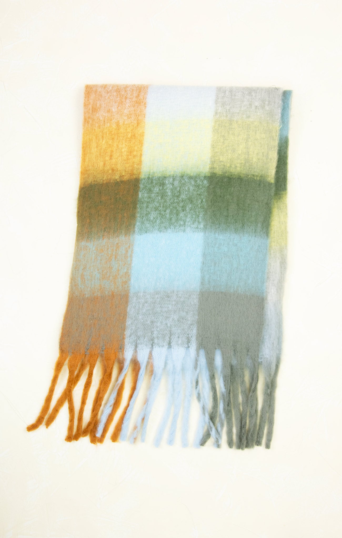 Plaid scarf with colorful pattern on a white background