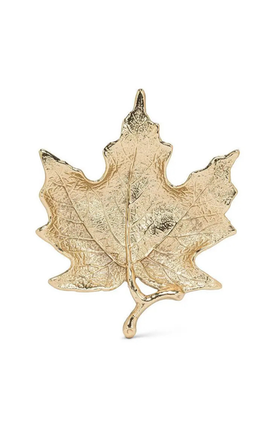 A gold maple leaf brooch with a textured, hammered finish, displayed on a clean white background.