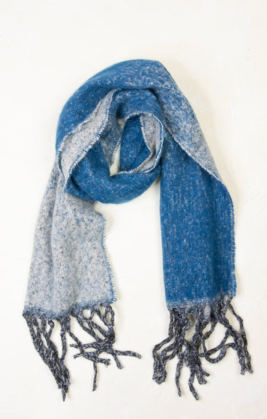 Blue and gray scarf with fringes on a white background