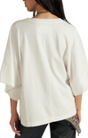 White blouse worn by a person on a white background