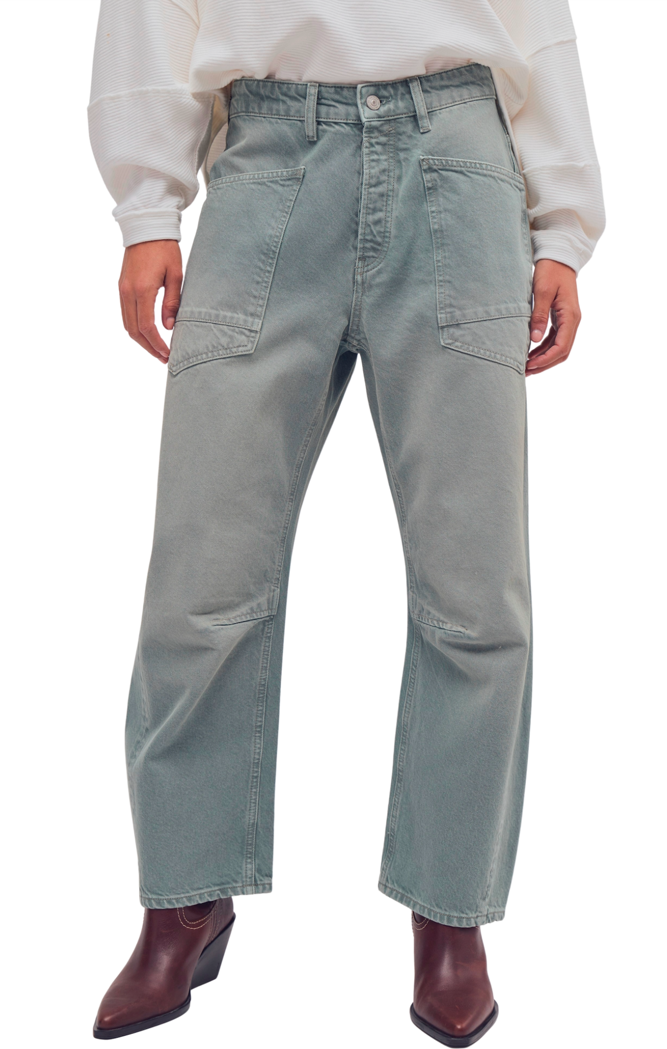 Person wearing light gray cargo pants on a white background