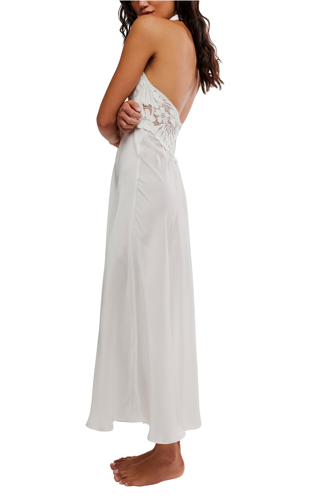 White dress with lace detailing on a white background