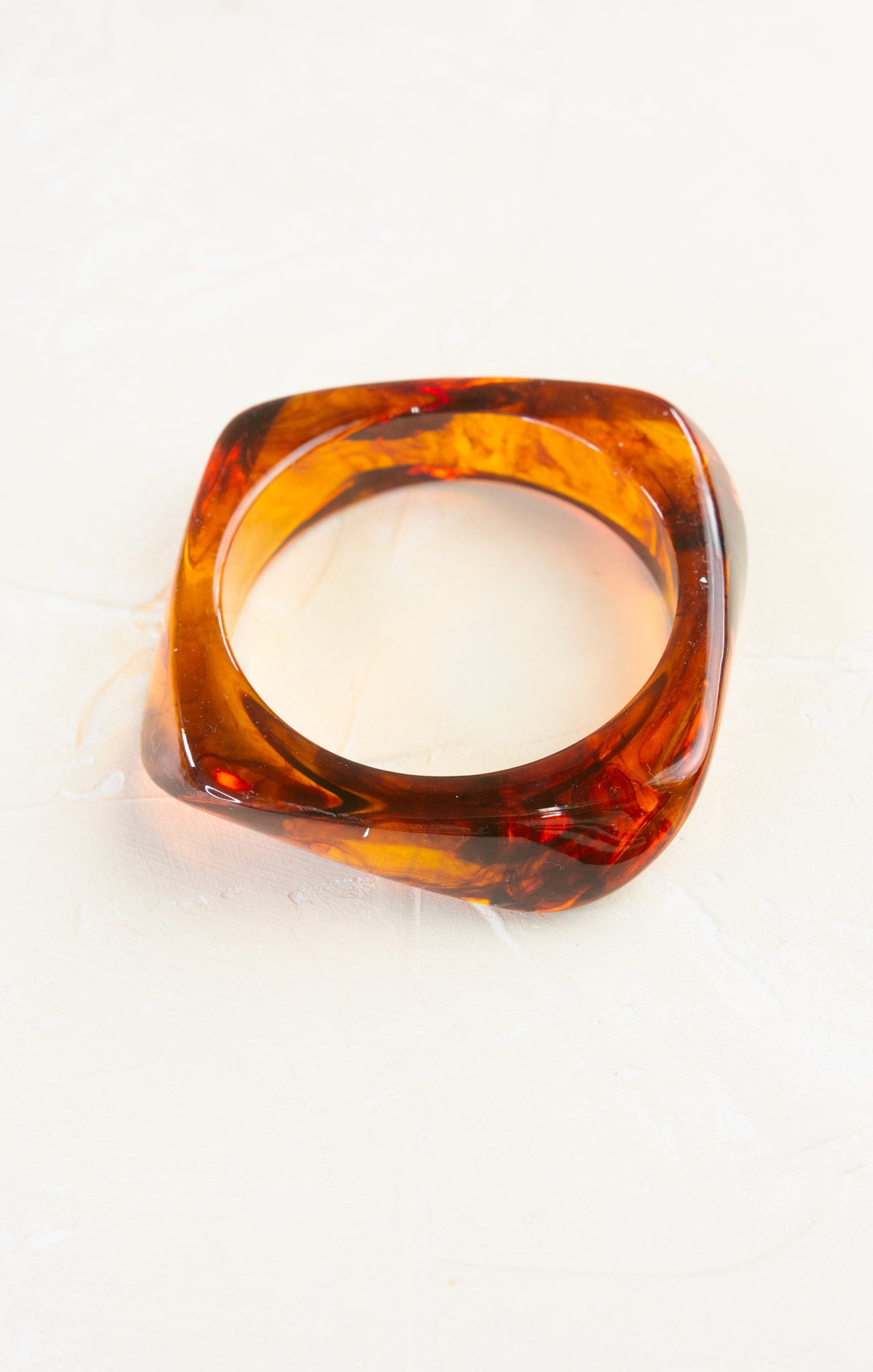 Tortoiseshell ring on a white background