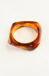 Tortoiseshell ring on a white background