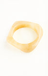 Triangular ring with a smooth surface on a white background