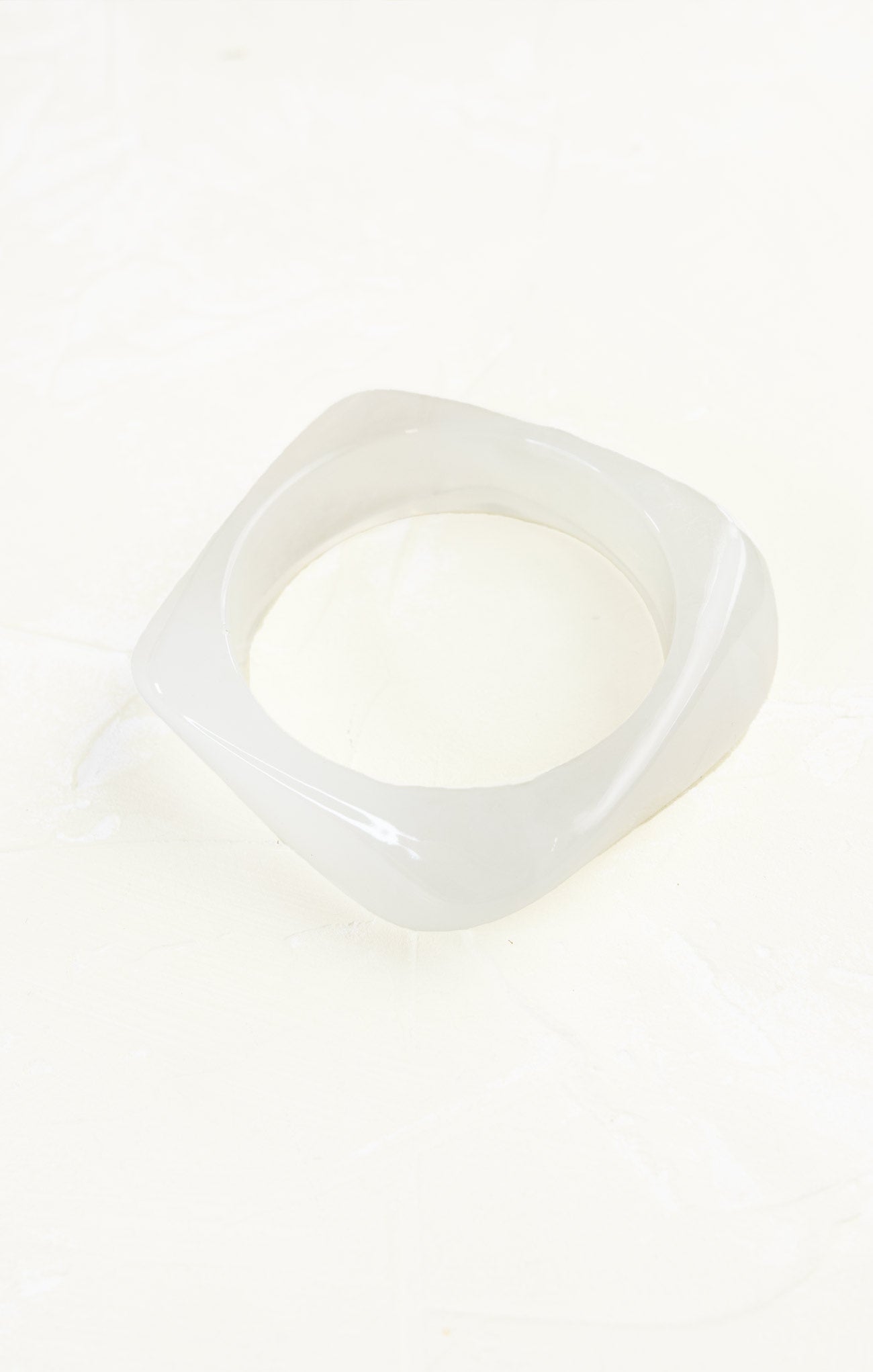 Clear plastic object on a white background