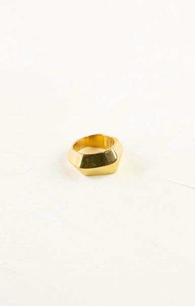 Gold ring on a white background