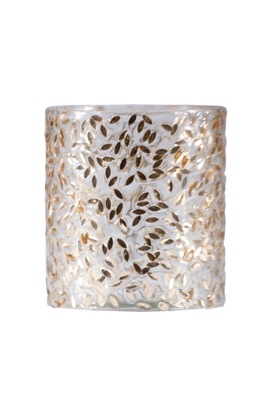 Decorative candle holder with leaf pattern on a white background