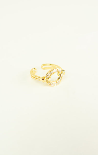 Gold open ring on a white background