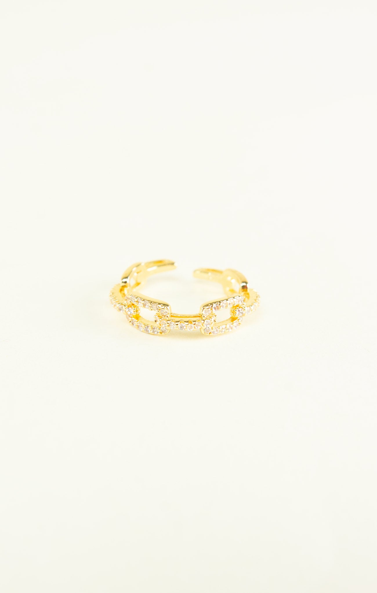 Gold ring on a white background