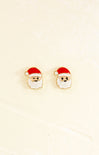 Santa Claus earrings on a beige background