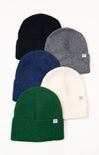 Five knit beanie hats in black, gray, blue, green, and white on a white background.