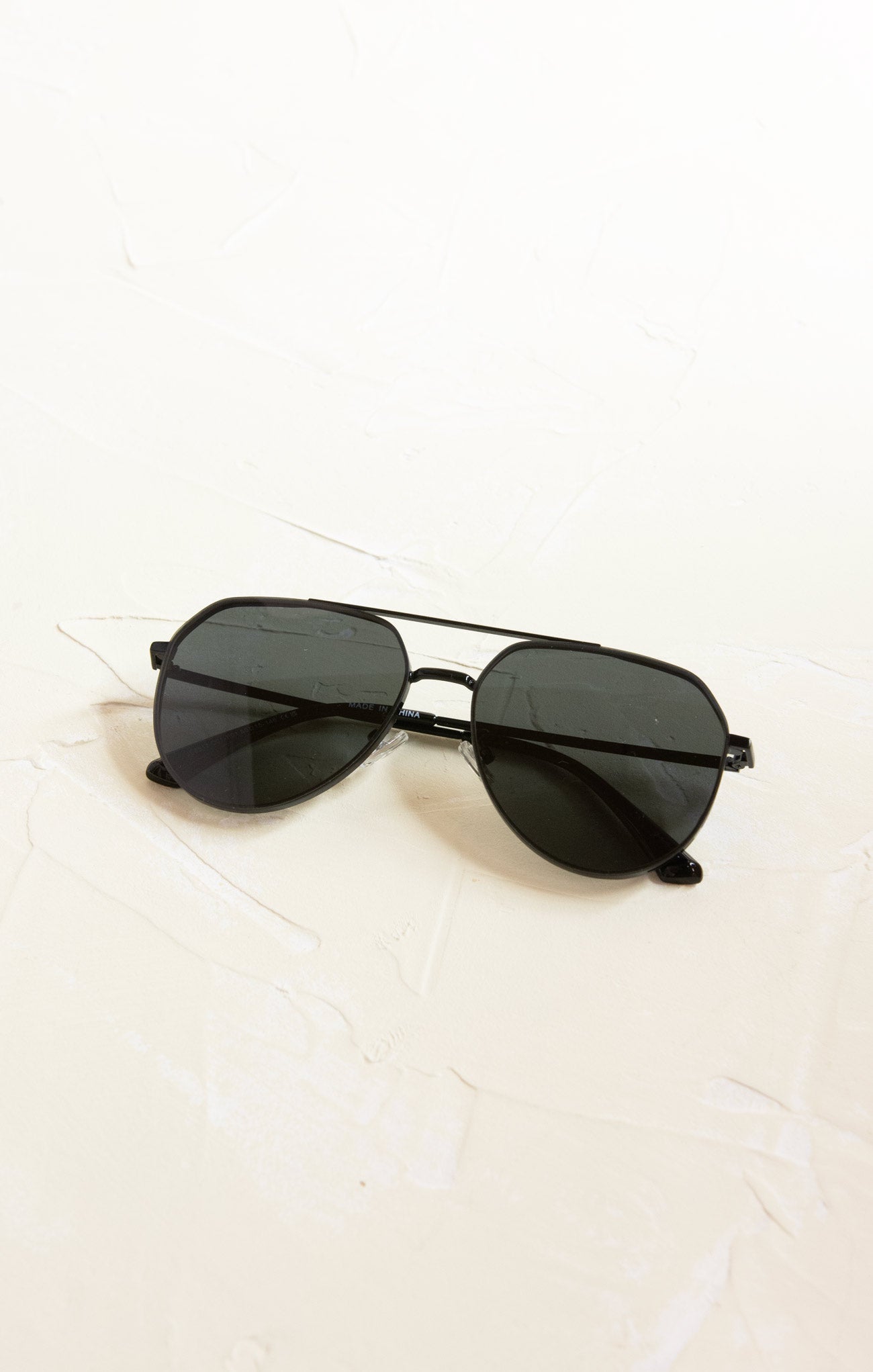 Black sunglasses on a white background