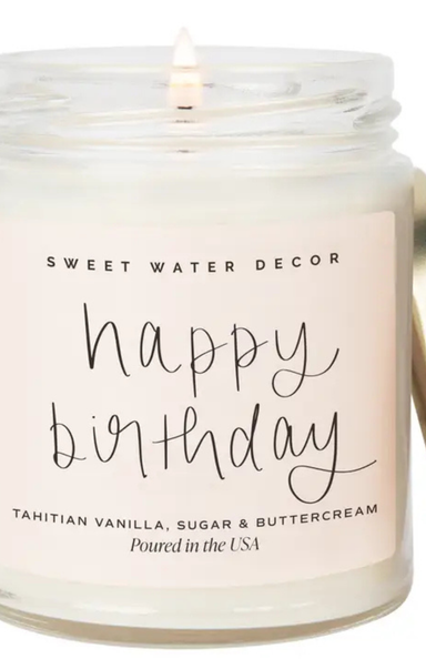 Candle with 'Happy Birthday' text and brand name on a white background