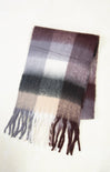Plaid scarf with fringes on a white background