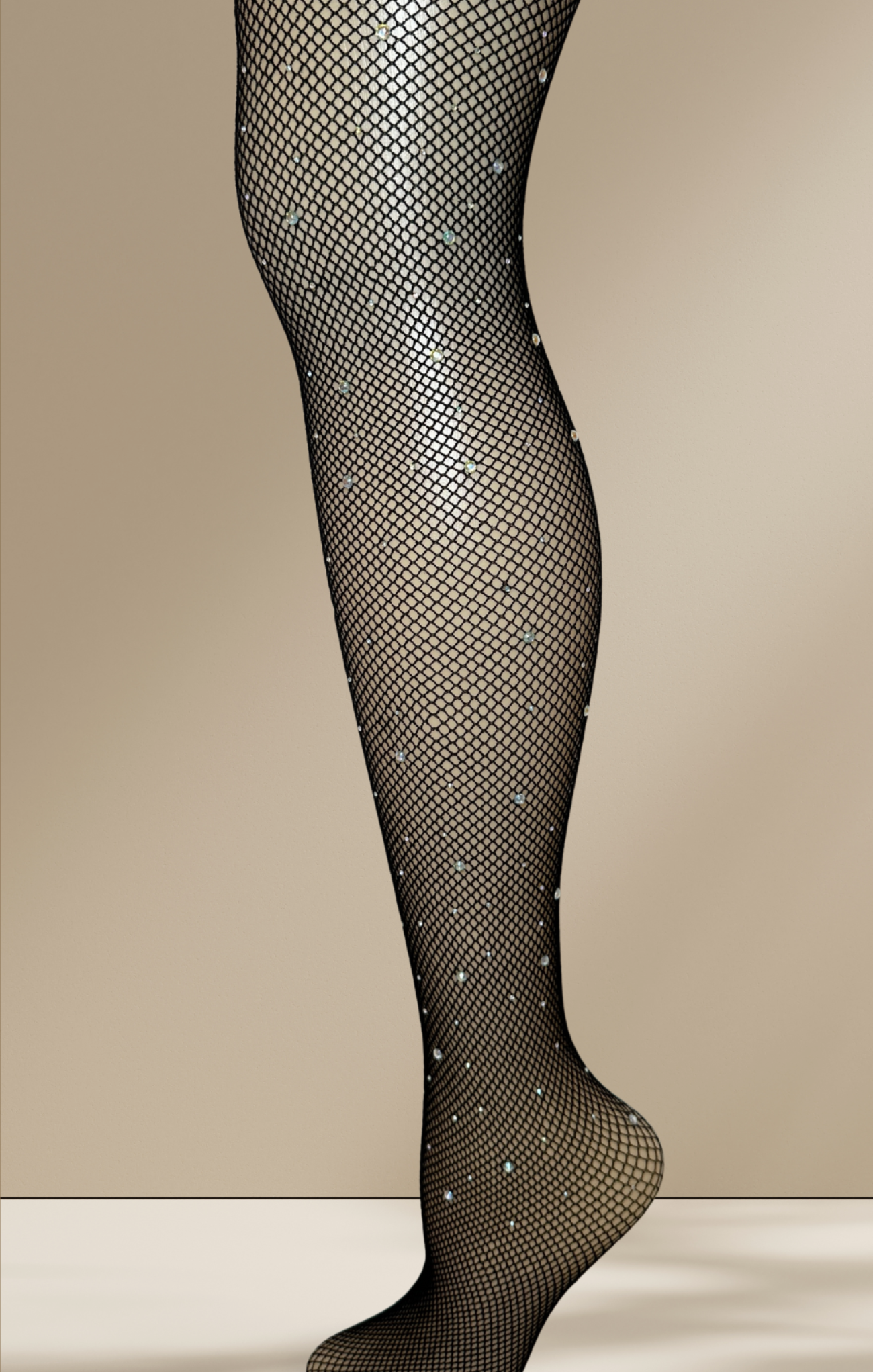 Black fishnet stockings with rhinestone accents on a beige background