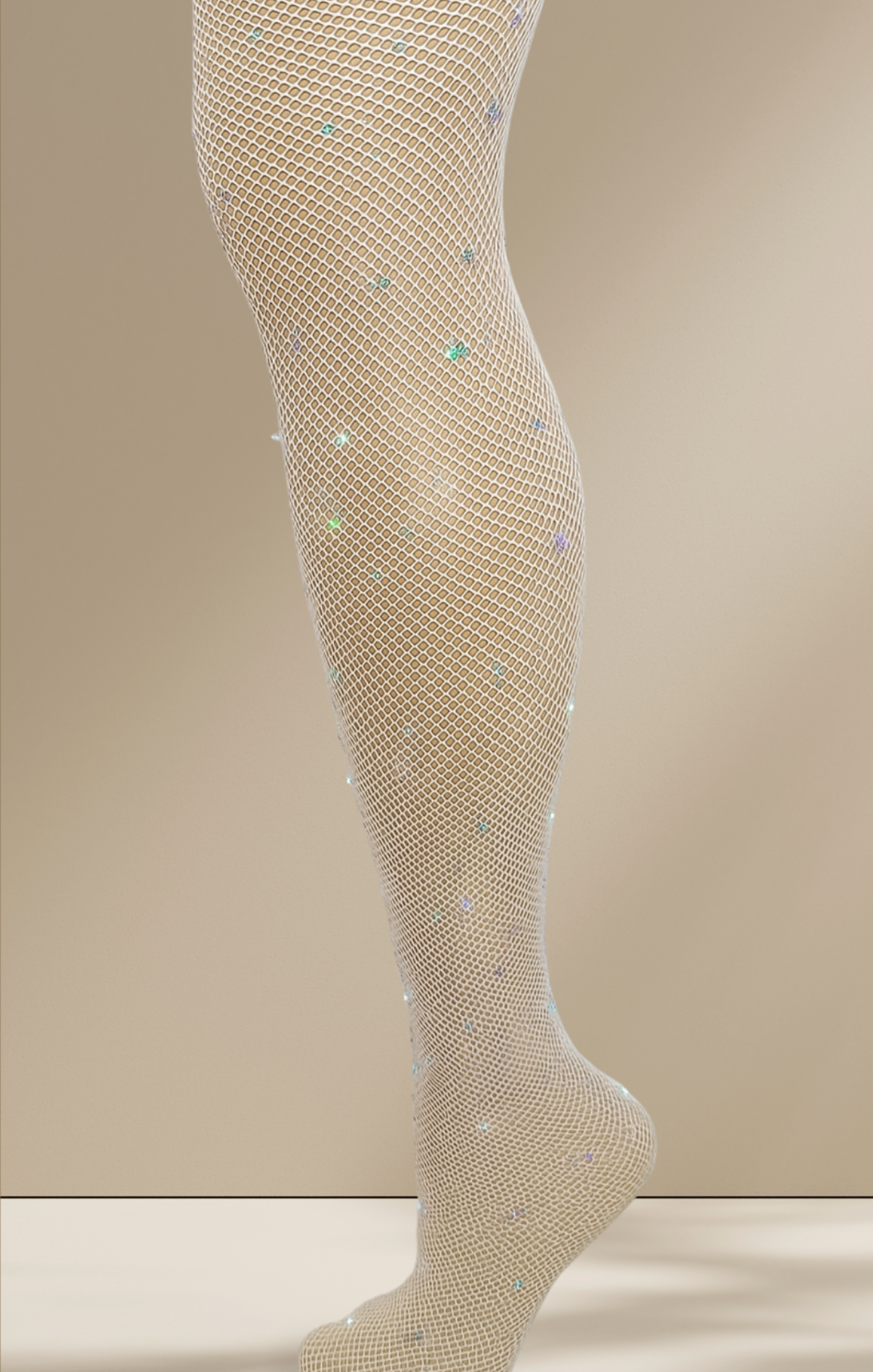 Beige fishnet tights with multicolored specks on a beige background