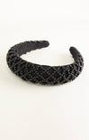 Black beaded headband on a white background