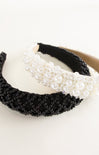 Black and white beaded headband on a white background