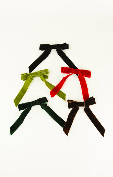 Set of colorful velvet ribbons on a white background