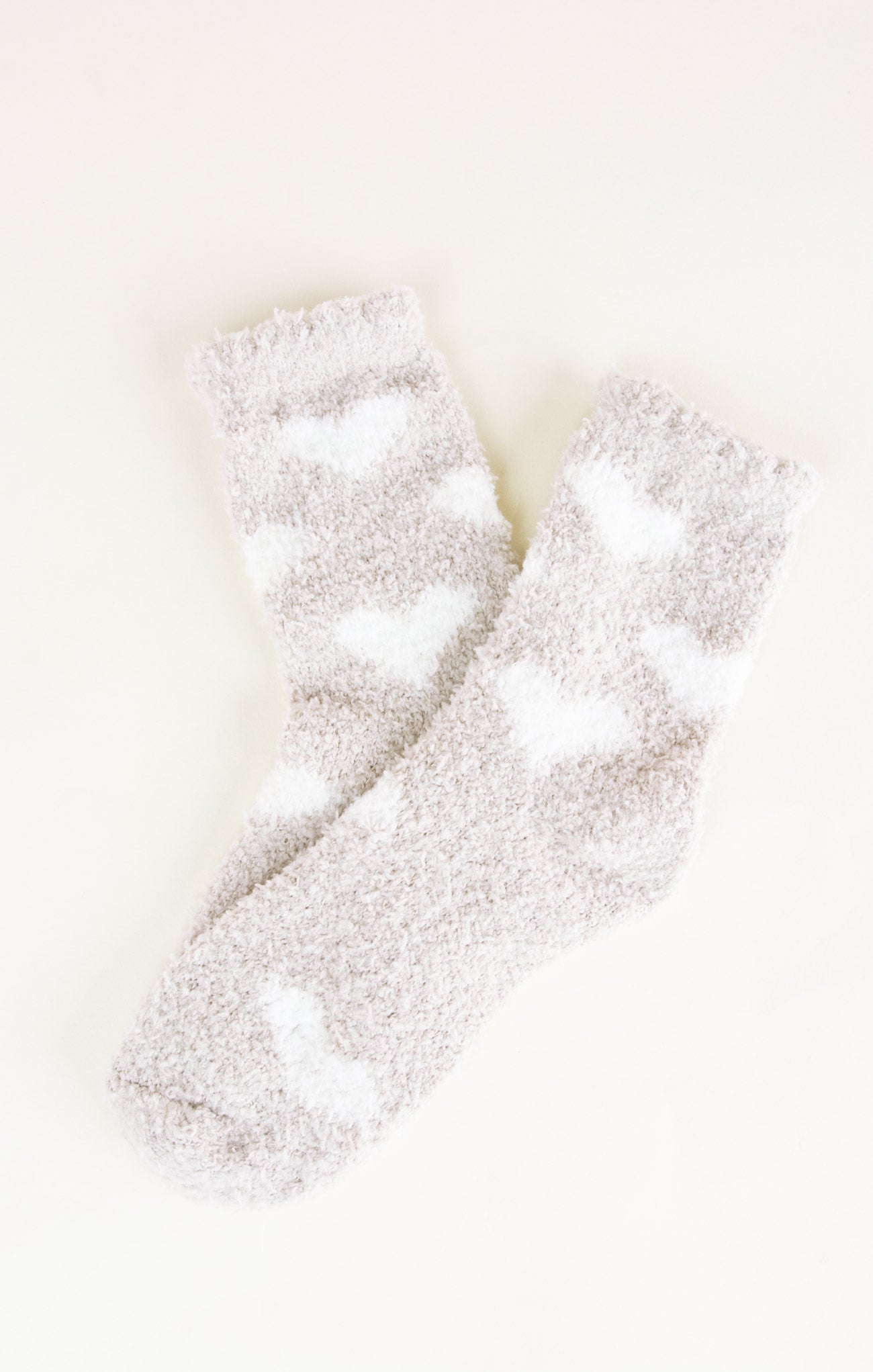 Pair of fluffy socks on a white background