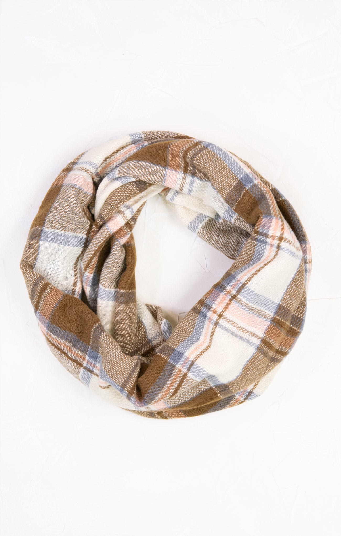 Plaid patterned headband on a white background