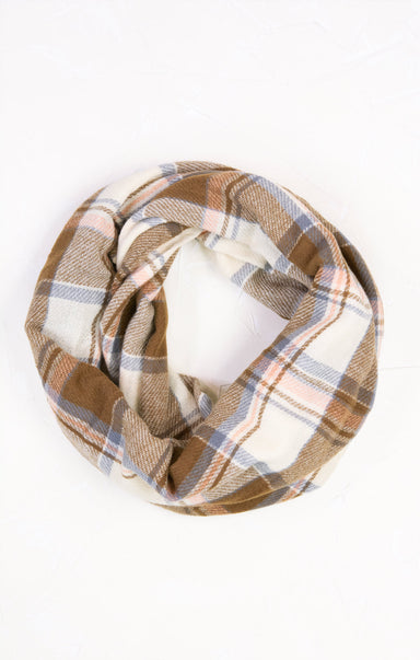 Plaid patterned headband on a white background