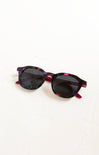 Sunglasses with a colorful frame on a white background