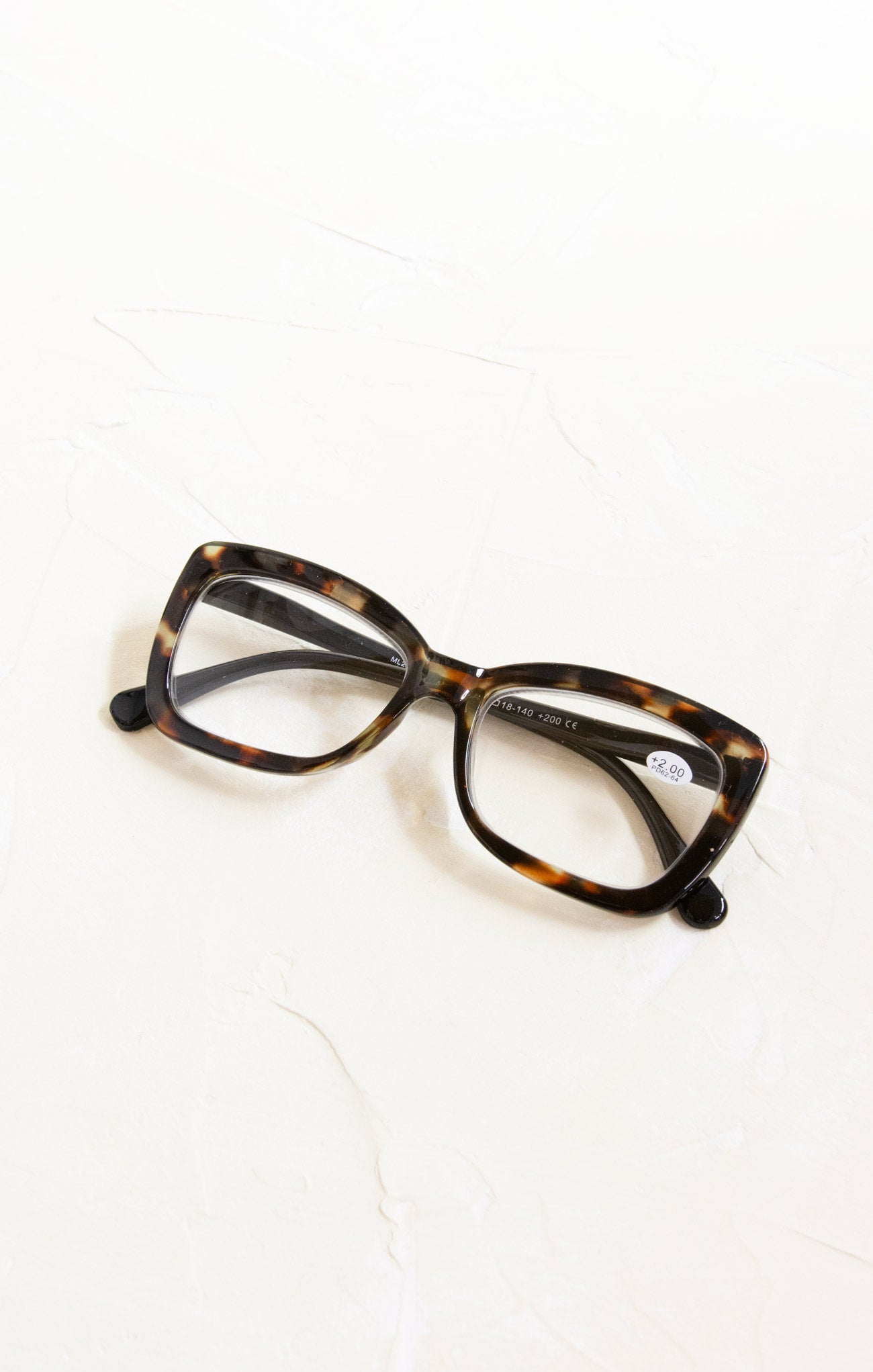 Tortoiseshell eyeglasses on a white background