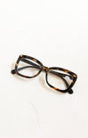 Tortoiseshell eyeglasses on a white background