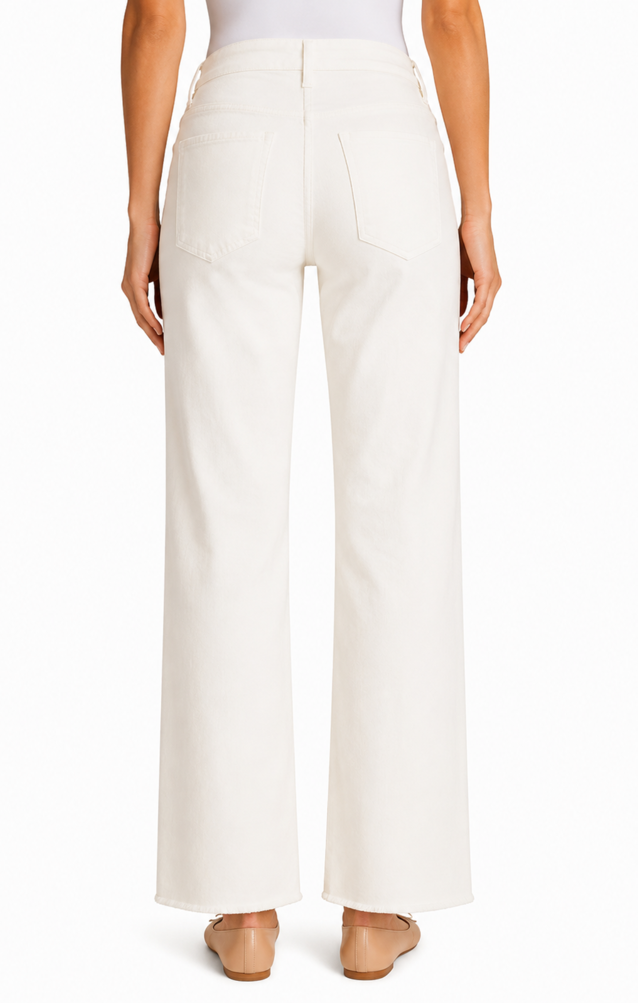 White pants worn by a person on a white background