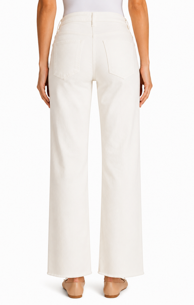White pants worn by a person on a white background