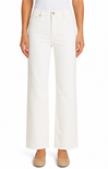 Person wearing white wide-leg jeans on a plain background