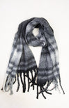 Plaid scarf with black and white pattern on a white background