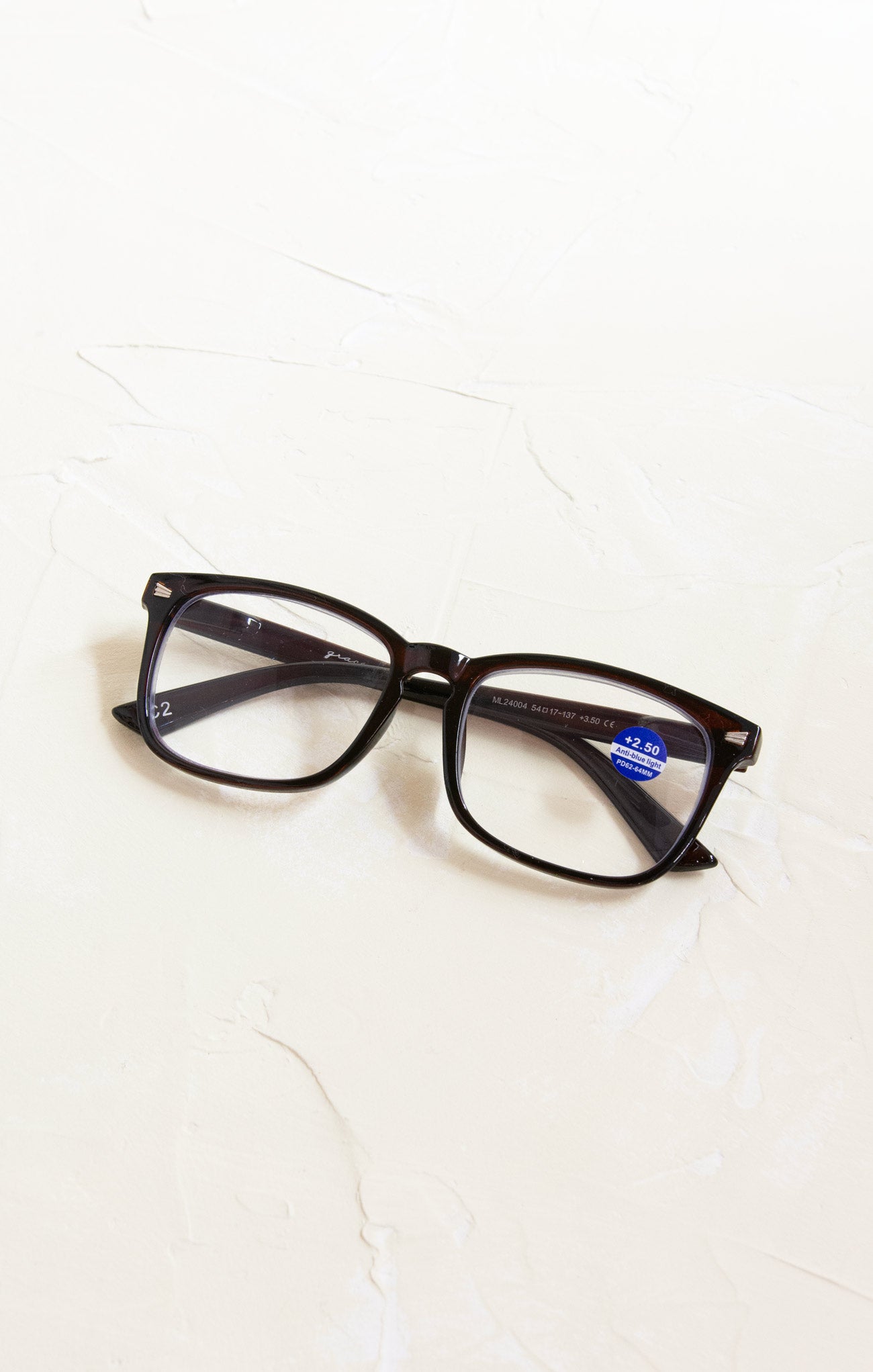 Black eyeglasses on a white background