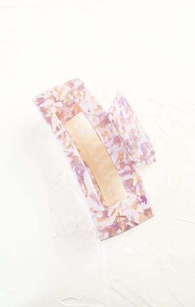 Floral-patterned tissue box cover on a white background