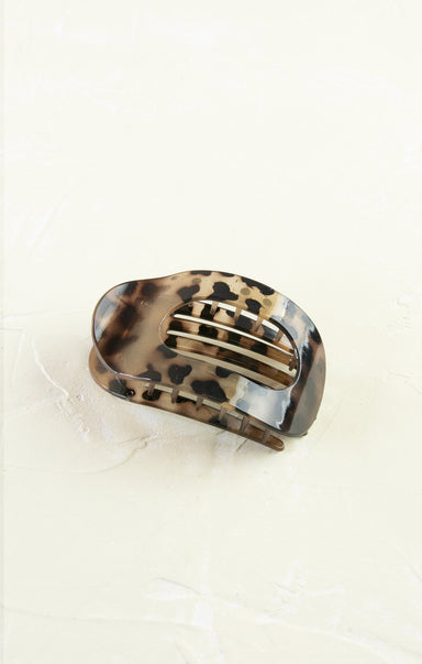 Tortoiseshell hair clip on a white background