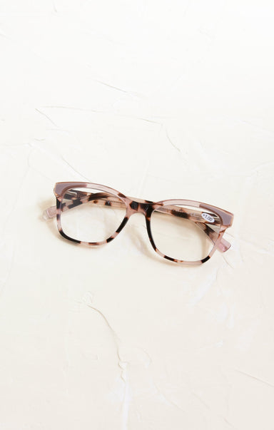 Pair of glasses with a tortoiseshell frame on a white background