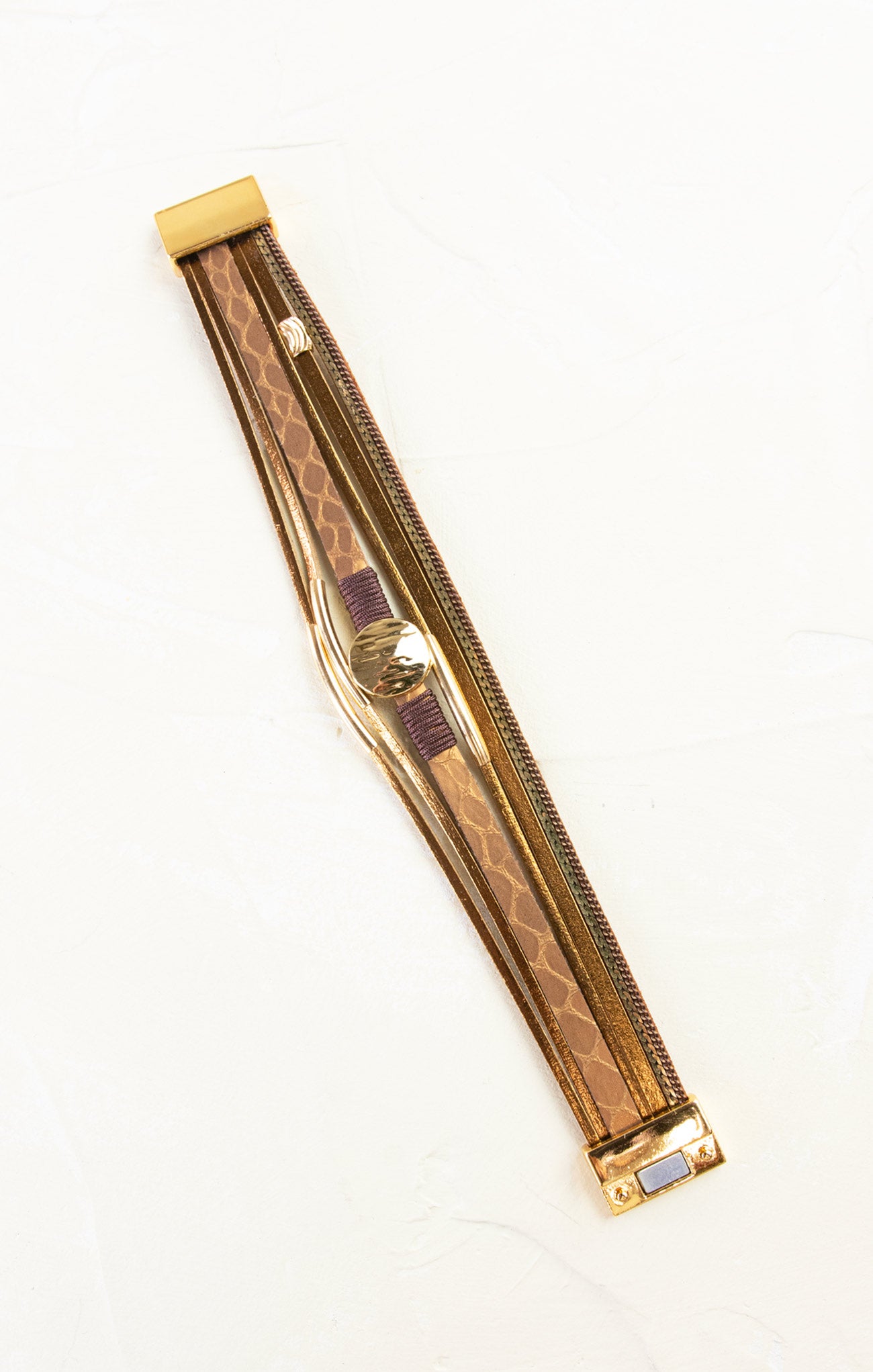 Wooden bow with gold accents on a white background