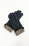 Black gloves with leopard print cuffs on a white background