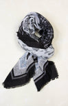 Black and white patterned scarf on a white background