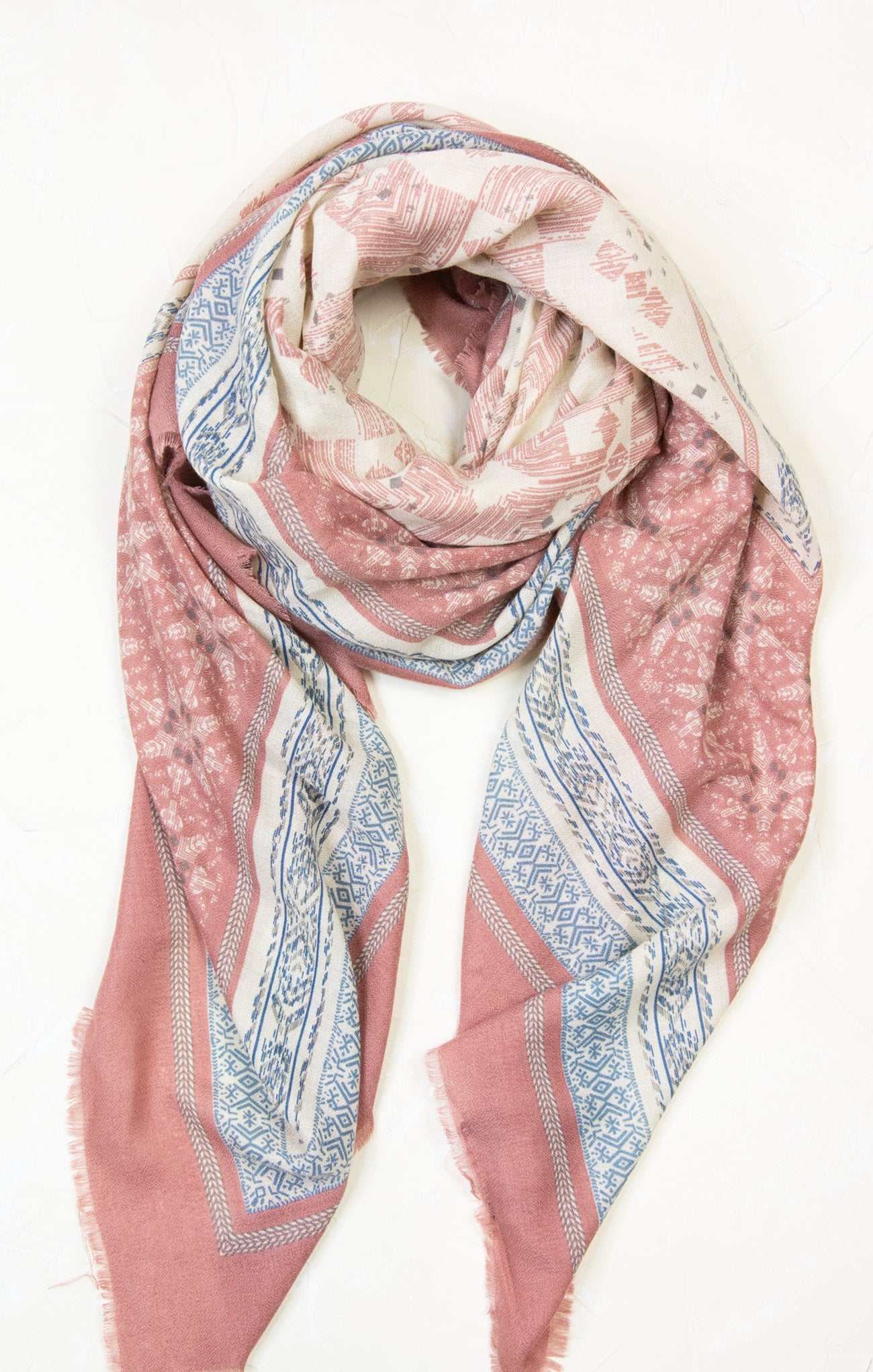 Pink patterned scarf on a white background