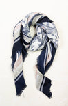 Navy and white patterned scarf on a white background