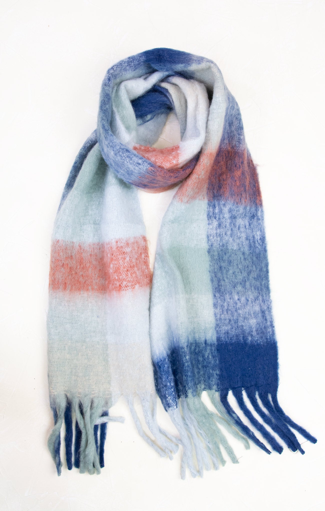 Plaid scarf with blue, red, and white colors on a white background