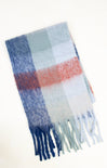 Plaid scarf with blue, red, and white colors on a white background