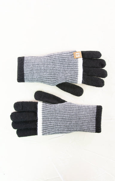 Pair of gray and black gloves on a white background