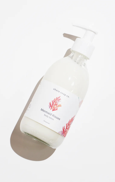 Bottle of Mermaid Kinetics body wash on a white background
