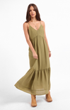 Woman wearing a green dress on a white background